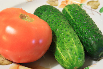 Tomato and two cucumbers