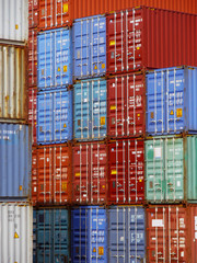 Fototapeta premium Stacks of shipping containers at a port
