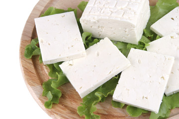 sliced white cheese on plate