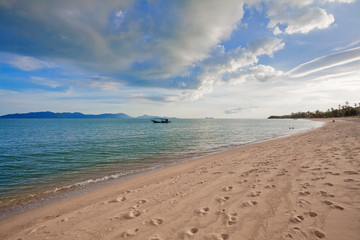 Tropical beach under blue sky. Thailand