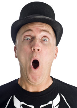 Man with Black Hat and T-Shirt Looks Surprised