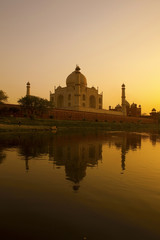 Fototapeta na wymiar Taj Mahal sunset reflection, Yamuna River.