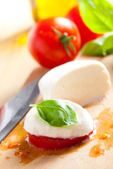 fresh mozzarella with tomato and basil
