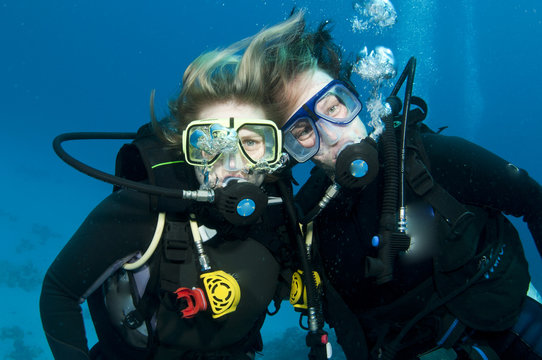 scuba divers having fun
