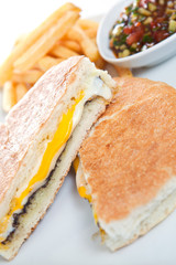 Cheese fillet with french fries and sauce