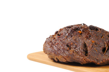 Roast beef on a wooden board