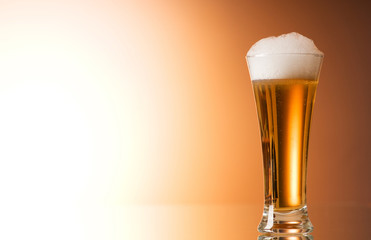 Beer glasses against the colorful gradient background