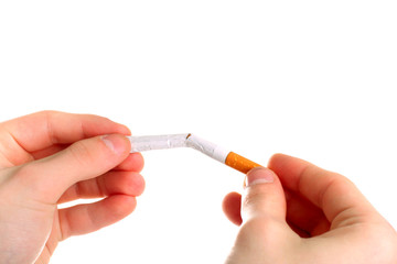 person breaking a cigarette isolated on the white