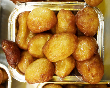 traditional Greek pancake balls "lukuma", honey assorted