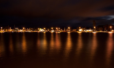Fototapeta na wymiar Port at dusk with a visible reflection