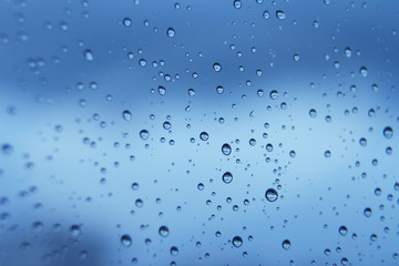 blue water soft bubbles on the window for background