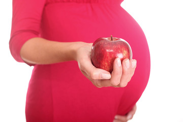 Pregnant Woman holding Apple