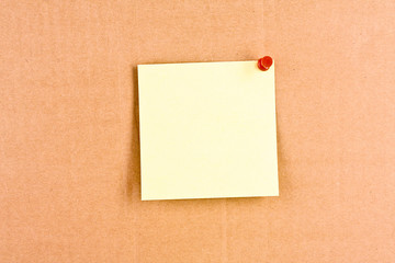 Three reminder notes  with pin on cardboard