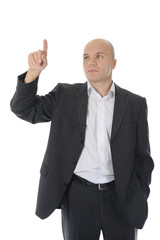 Businessman points finger up
