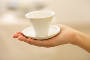 Coffee cup in your hand