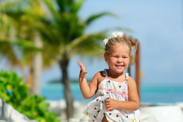 happy cute girl have a fun on tropical beach