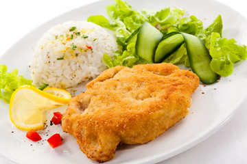 Fried pork chop with white rice and vegetable salad