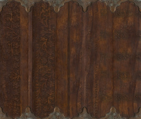 Wood and metal carved scroll work background