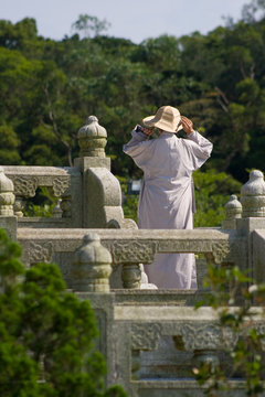 Man worshipping Buddha at Ngong Ping