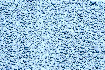 Water drops on a glass background
