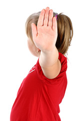 Small girl shows denial with her hand isolated on white