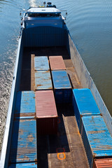 ship on river transports container
