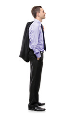 Full lenght of a businessman waiting in line