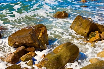varicoloured rocks on a sea suds