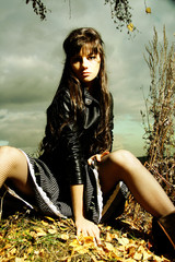 Obraz premium Perfect fashionable sexy lady relaxing outdoors