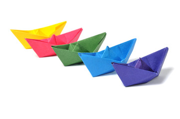Close up origami ship over white