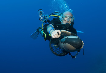 diver on underwater scooter