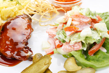 Meat plate with potatoes
