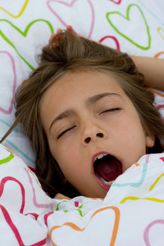 bailler dans son lit