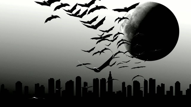 Halloween, a flight of bat with the city in background