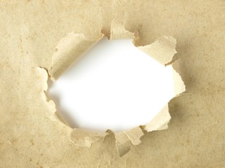 Agujero blanco sobre papel antiguo