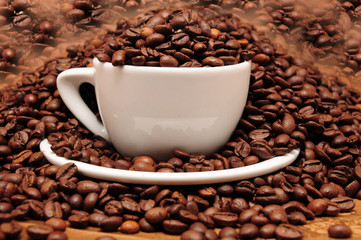 Cup full of coffee beans