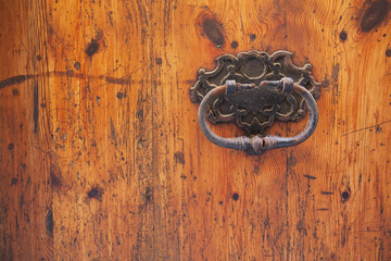 old brown door with beautiful metal handle