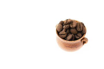 a small pot of coffee beans isolated on white