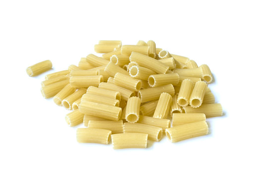 Pile of pasta pieces isolated over white