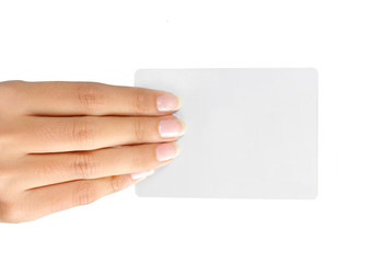Fototapeta premium Gesture of a beautiful woman's hand showing a white card