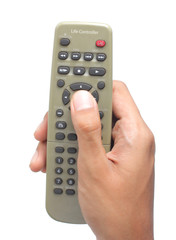 gesture of hand using grey remote control