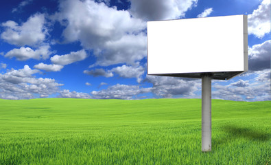 Big blank billboard in green field