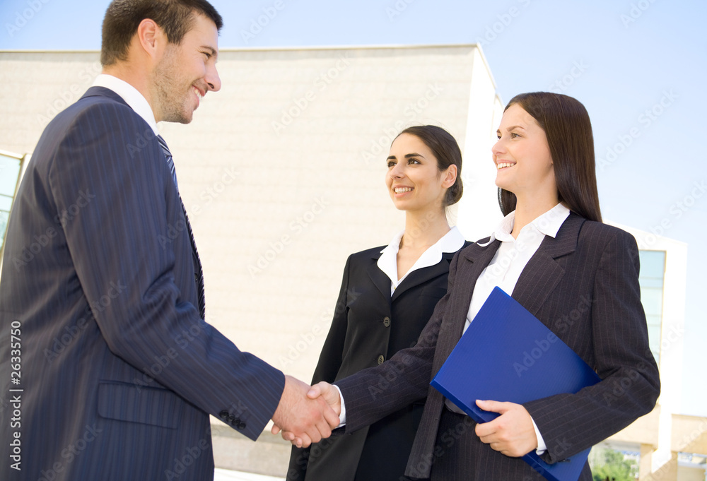 Wall mural businesspeople shake hands