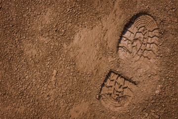 Fototapeta Footprint on mud with copy space obraz