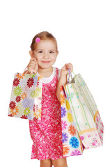 happy little girl with shopping bags