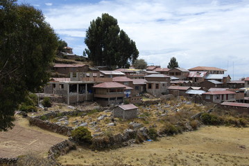 Fototapeta premium A view on a village and cemetery, Taquile island