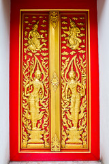 Fototapeta na wymiar Traditional thai style door of Buddhist church