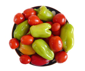 Fresh tomato and pepper on a plate