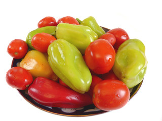 Fresh tomato and pepper on a plate