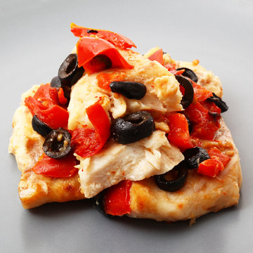 filetti di merluzzo  con pomodori ed olive